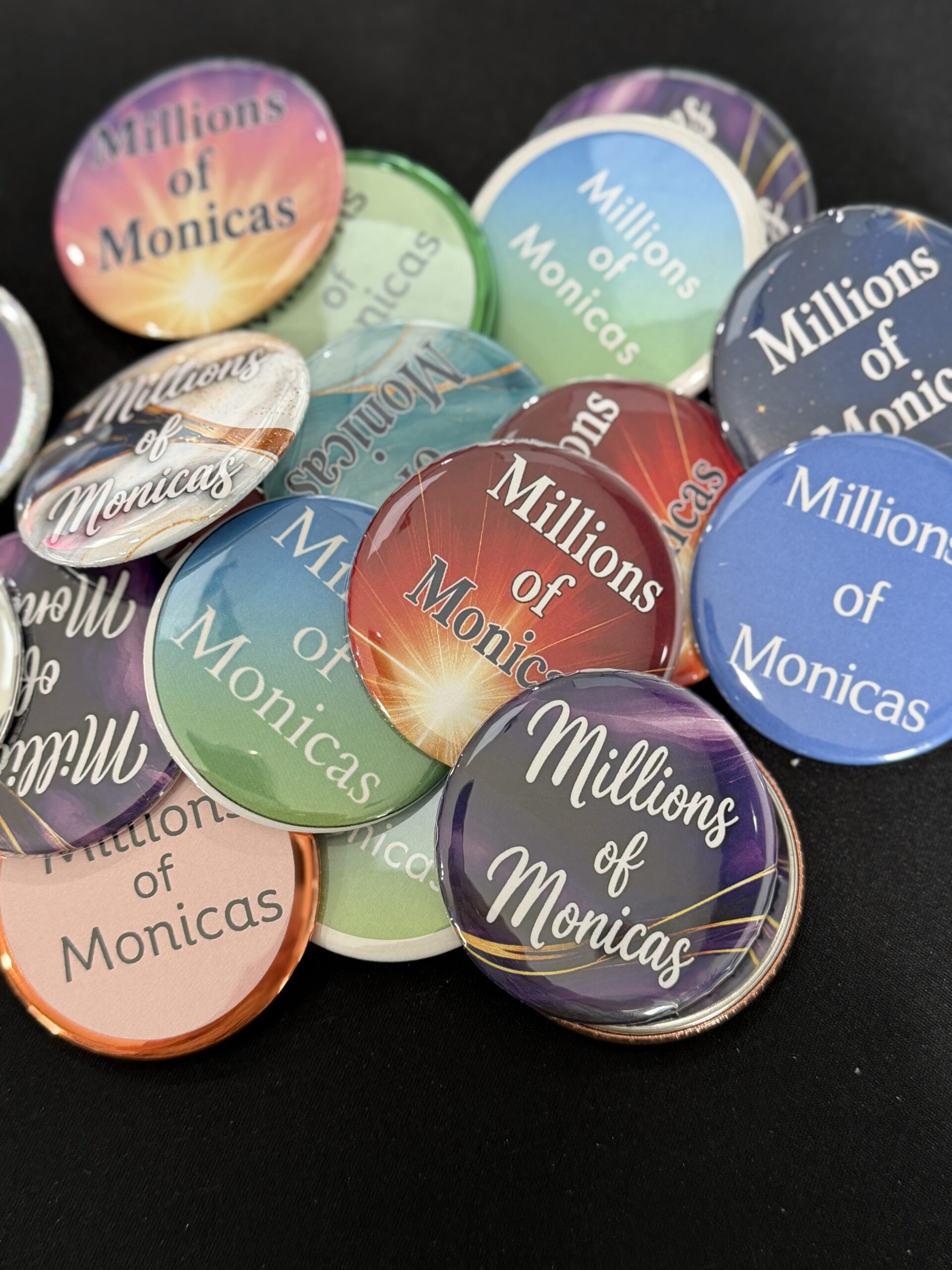 In English - Millions of Monicas Buttons (20 Assorted) - Includes a button for your priest